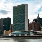 "United Nations Headquarters building in New York City overlooking the East River"