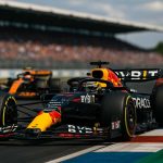 Formula 1 race car speeding on track during a motorsport event"