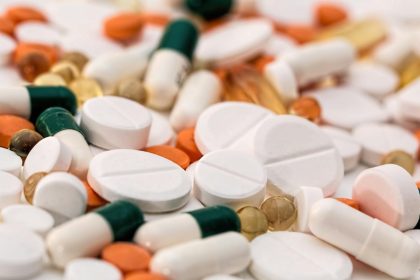 "Close-up of assorted pills, tablets, and capsules in various colors"